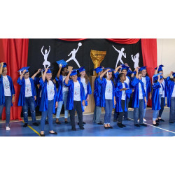 kinder  garten and elemantry school gowns and hats 